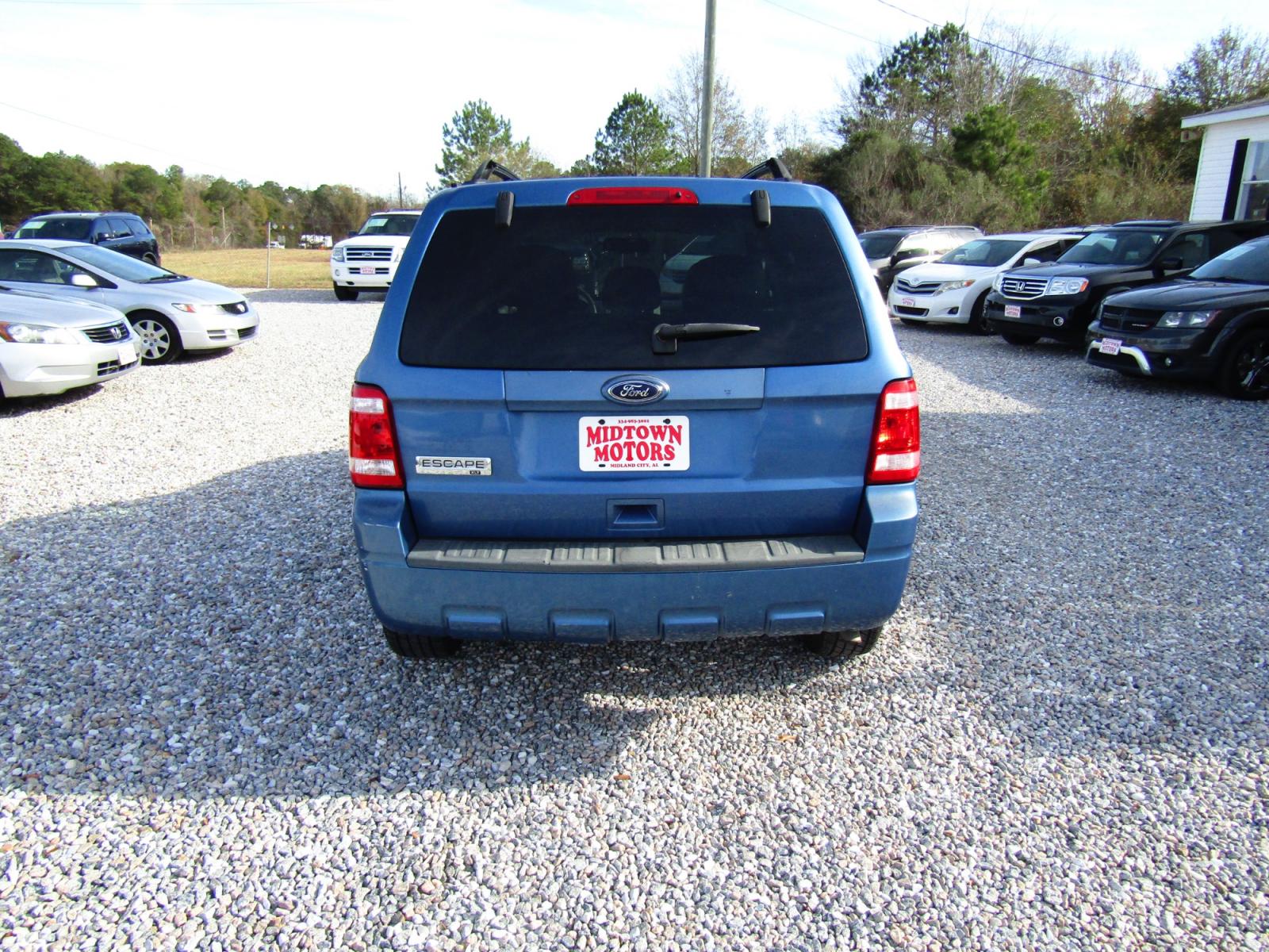 2010 Blue /Black Ford Escape XLT FWD (1FMCU0D72AK) with an 2.5L L4 DOHC 16V engine, Automatic transmission, located at 15016 S Hwy 231, Midland City, AL, 36350, (334) 983-3001, 31.306210, -85.495277 - Photo #6